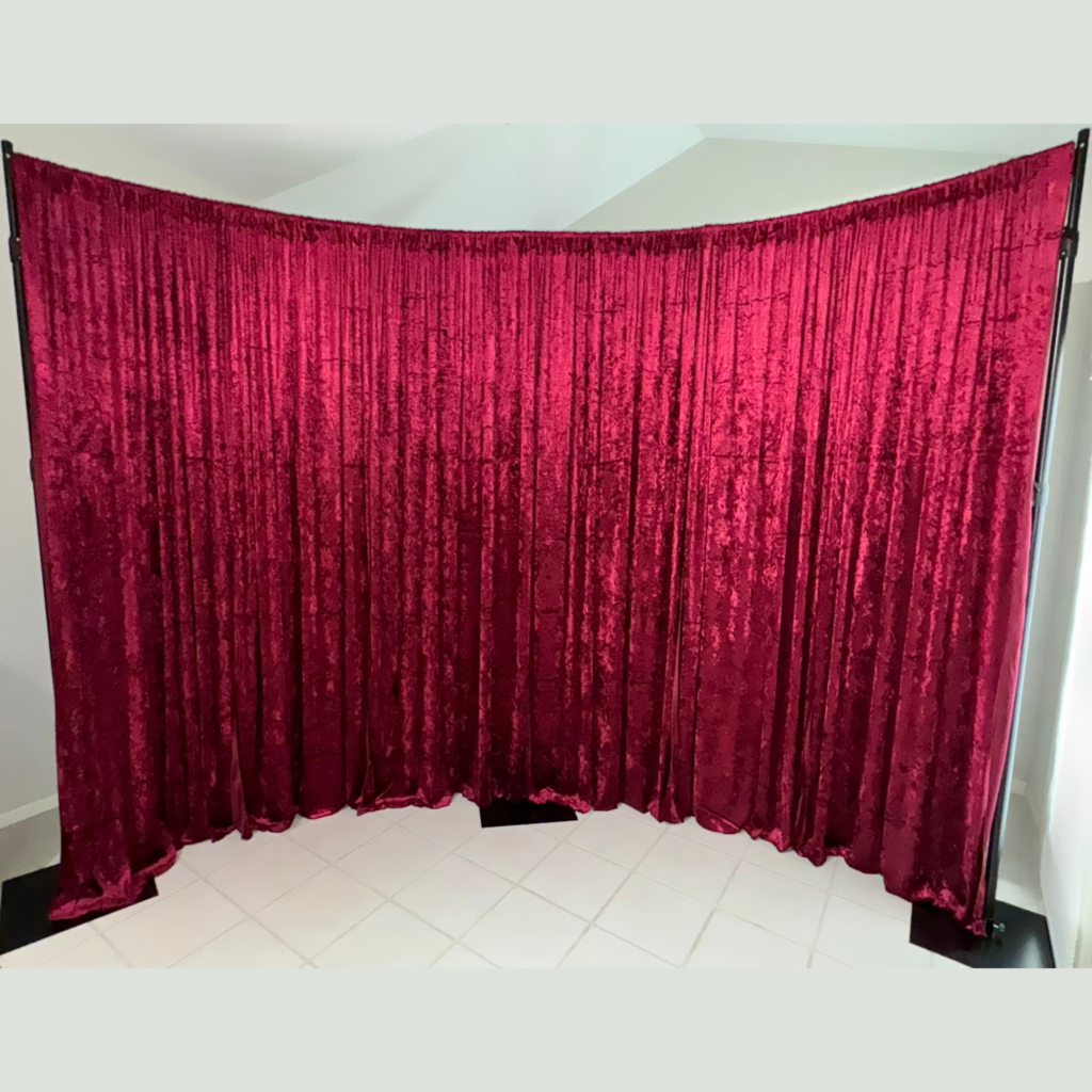 Burgandy Velvet Drape Backdrop with Curved Pipe and Drape